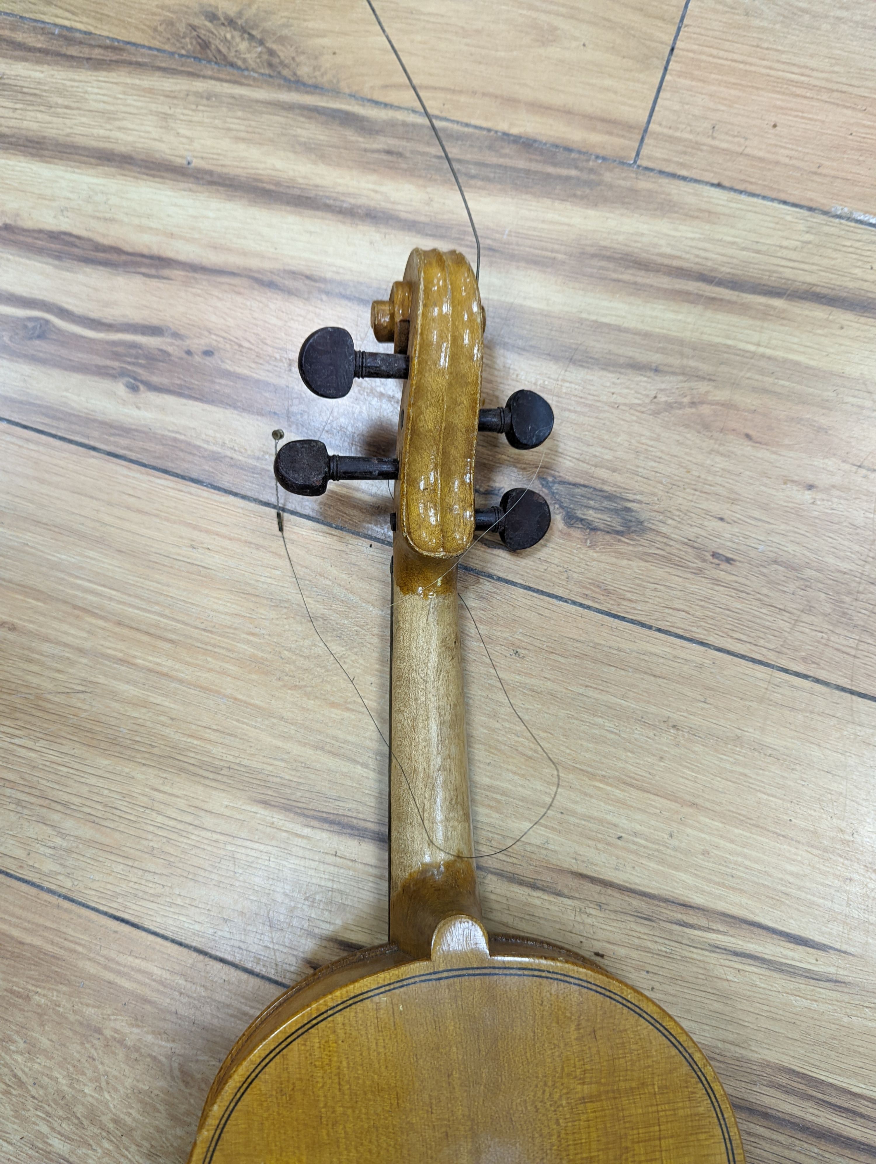 A violin and bow, various records etc